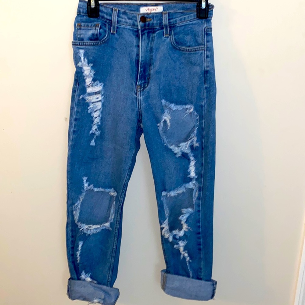 Blue ripped jeans.